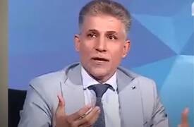 قوة امنية تعتقل  الدكتور  حامد اللامي